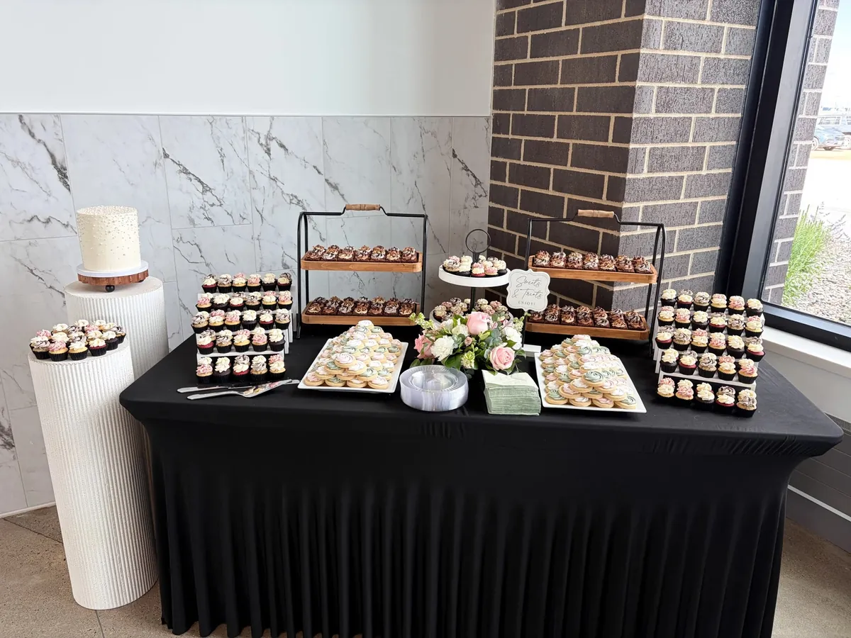 Bakehouse 23 cake, cupcakes and cookies displayed at an event